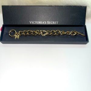Victorias secret gold winged link clip bracelet.